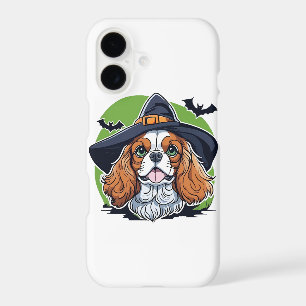 A dog wearing a witches hat with bats