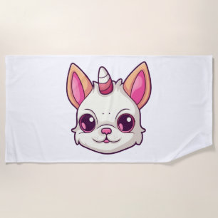 a dog with unicorn horns beach towel