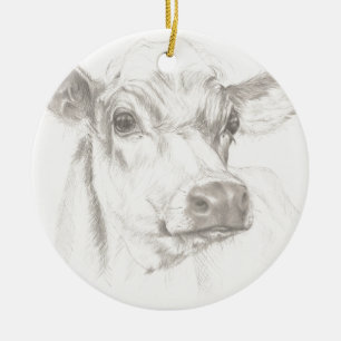A drawing of a young cow ceramic tree decoration
