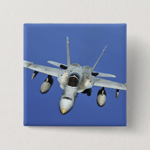 A F/A-18 Hornet participates in a mission 15 Cm Square Badge