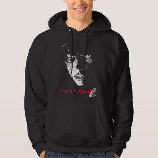 a face in darkness hoodie