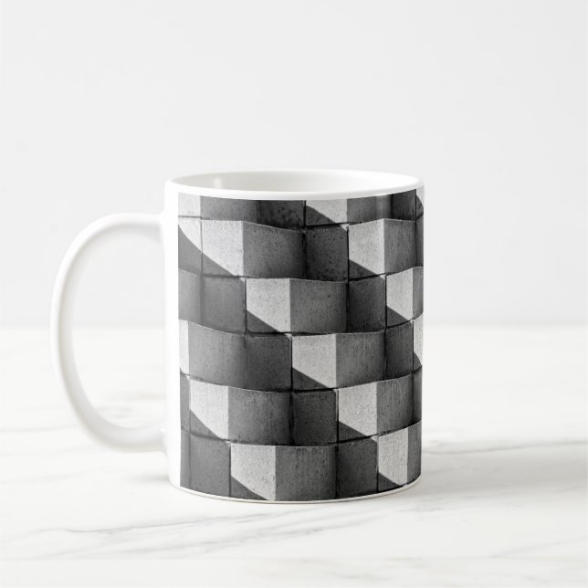 A face of the "Four Sided Pyramid" sculpture in th Coffee Mug (Left)
