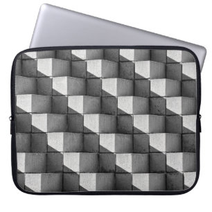 A face of the "Four Sided Pyramid" sculpture in th Laptop Sleeve