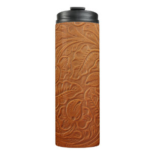 A fancy tan brown light coloured background made o thermal tumbler