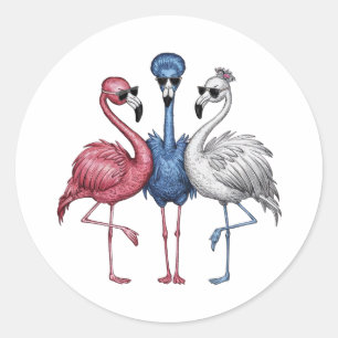 A featuring three unique flamingos that are quite  classic round sticker