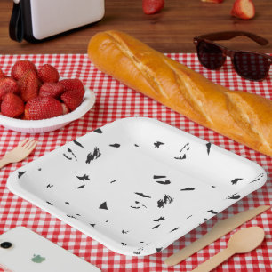 A flock of birds flying in the sky. paper plate