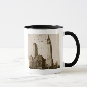 A flock of birds flying mug