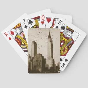 A flock of birds flying playing cards