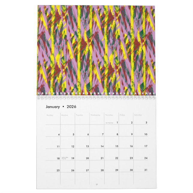 A fluffy grey cat with green eyes sits on a window calendar (Jan 2026)