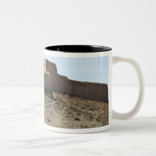 A fortified compound in the village of Akbar Kh Two-Tone Coffee Mug