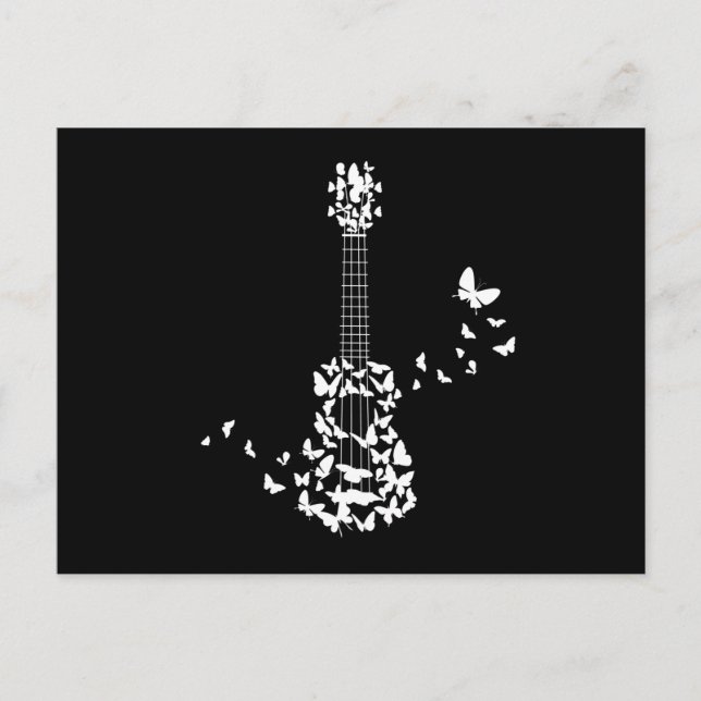 A Four String Ukulele Instrument With Beautiful Postcard (Front)
