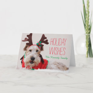 A fox terrier is dressed up for Christmas Holiday Card