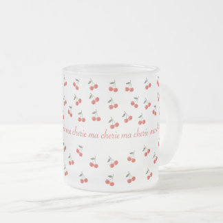 A frosted glass mug with cherry pattern