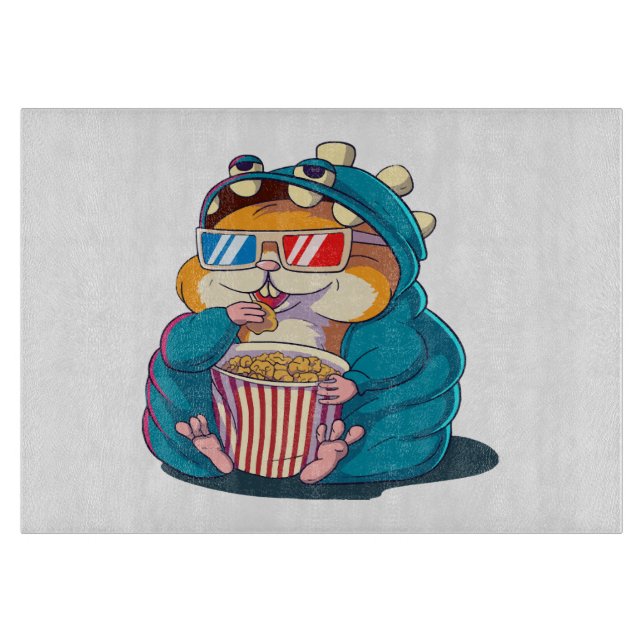 A funny hamster wearing glasses eats popcorn cutting board (Front)