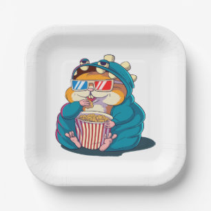 A funny hamster wearing glasses eats popcorn paper plate