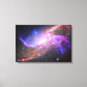 A Galactic Light Show In Spiral Galaxy Ngc 4258. Canvas Print