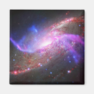 A Galactic Light Show In Spiral Galaxy Ngc 4258. Magnet