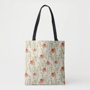 A garden of green ferns brightened by orange flowe tote bag