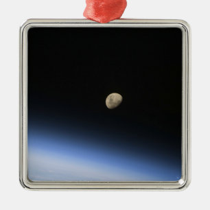 A gibbous moon visible above Earth's atmosphere 2 Metal Tree Decoration