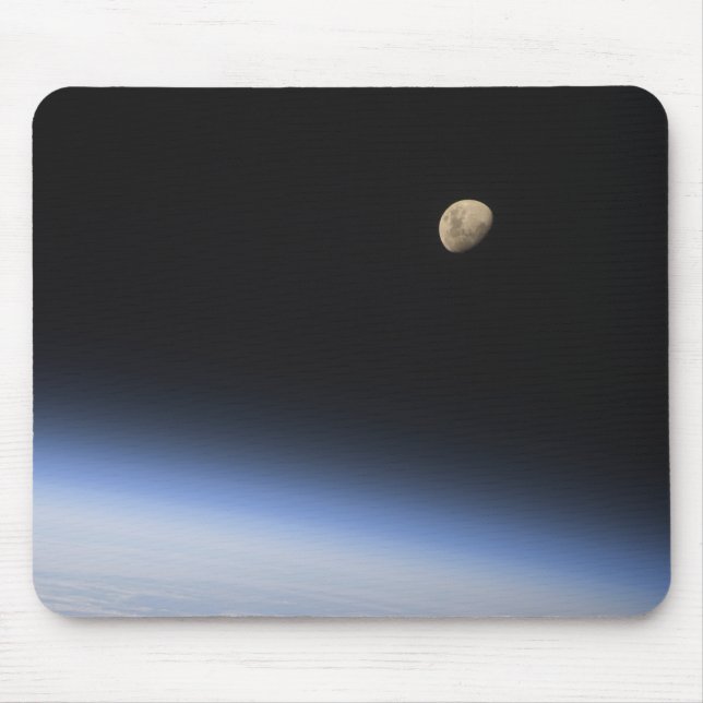 A gibbous moon visible above Earth's atmosphere Mouse Mat (Front)