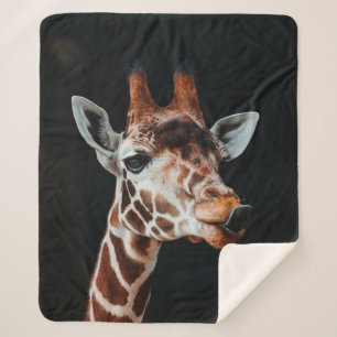 A GIRAFFE AT CALGARY ZOO POKING HIS TONGUE OUT SHERPA BLANKET