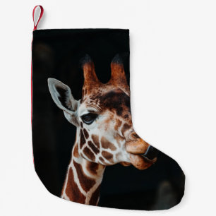 A GIRAFFE AT CALGARY ZOO POKING HIS TONGUE OUT SMALL CHRISTMAS STOCKING