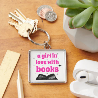 A girl in love with books design key ring