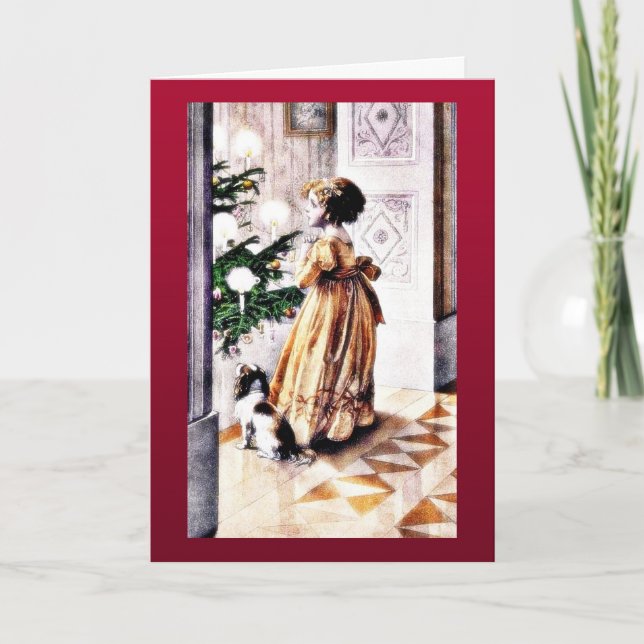 A girl with a dog praying infront of christmas tre holiday card (Front)