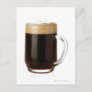 A glass of dark beer postcard