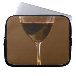 A glass of red Chateau Belgrave in sunlight - Laptop Sleeve