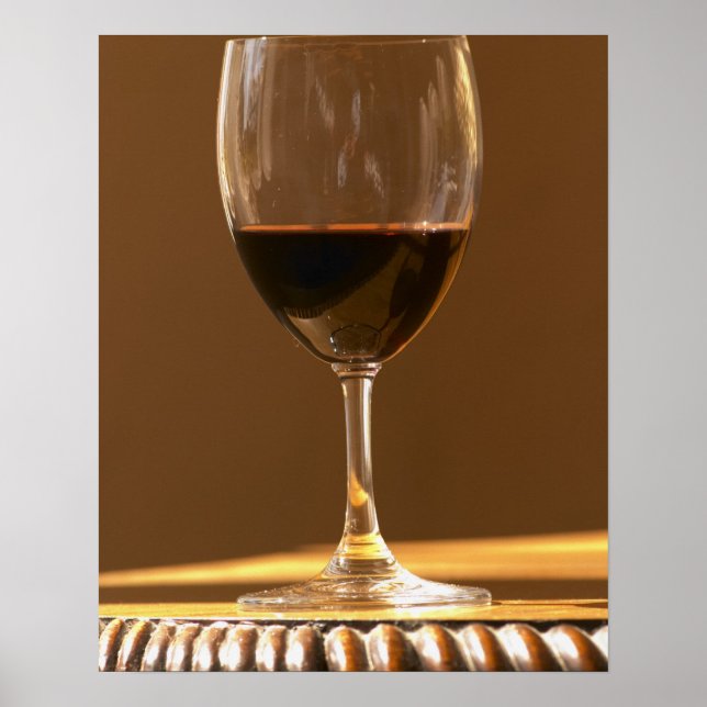 A glass of red Chateau Belgrave in sunlight - Poster (Front)