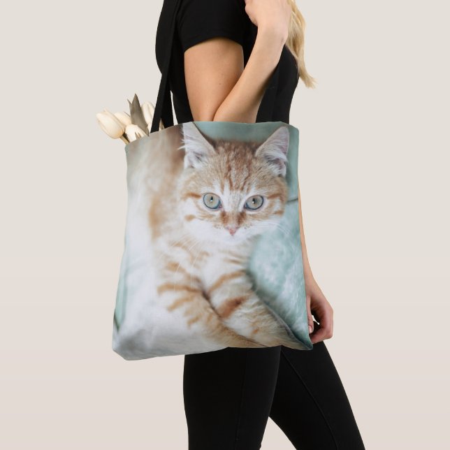 A Golden Colour Kitten Lying Down Tote Bag (Close Up)