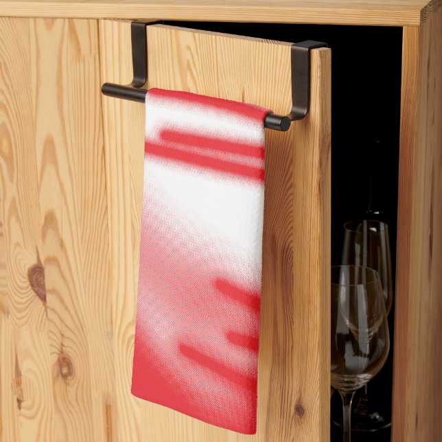 A graphic design featuring bold red and orange sha tea towel (Thirds Fold)