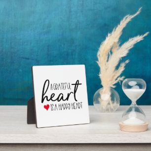 A grateful heart is a happy heart quote typography plaque