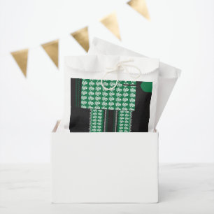 a green and black pattern with a tree in the middl favour bags