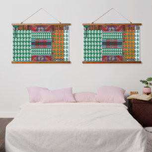 a green and black pattern with a tree in the middl hanging tapestry