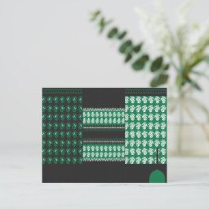 a green and black pattern with a tree in the middl postcard