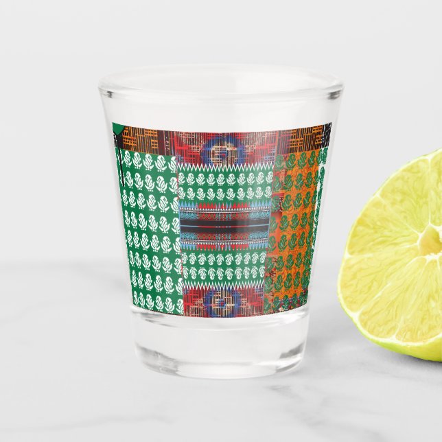 a green and black pattern with a tree in the middl shot glass (Front)