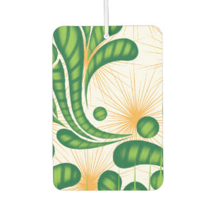 A green and gold artistic pattern depicting a tree car air freshener