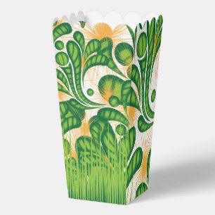 A green and gold artistic pattern depicting a tree favour box