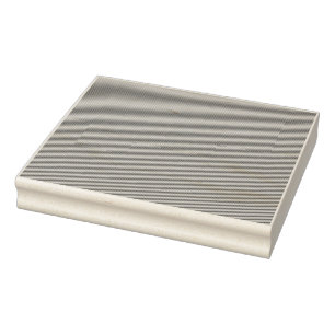 A green and gold artistic pattern depicting a tree rubber stamp