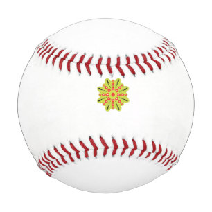 a green and red flower with black dots baseball