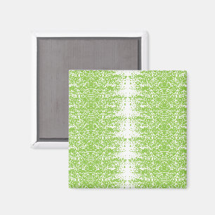 a green and white background with small dots magnet