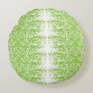 a green and white background with small dots round cushion