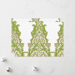 a green and white wallpaper with ornate designs holiday card