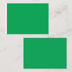 a green background with a place card