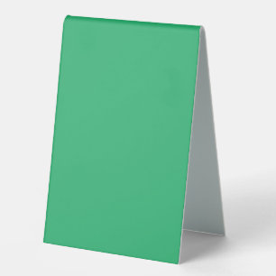 a green background with a white border