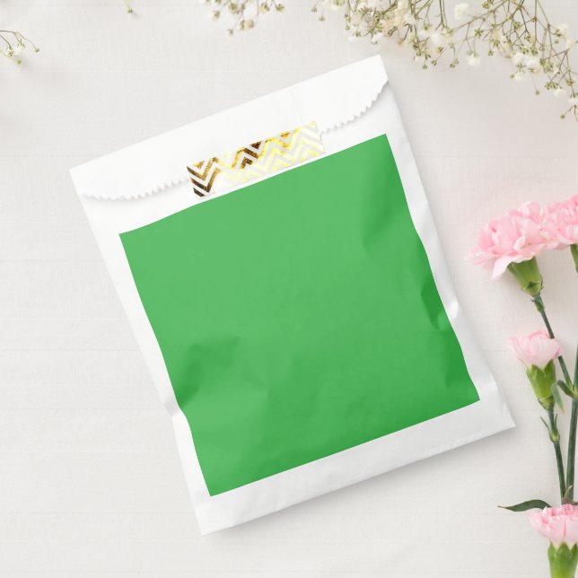 a green background with a white border favour bags (Sealed)
