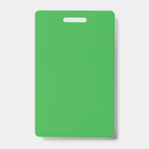 a green background with a white border ID badge