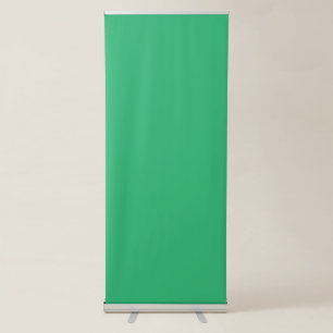 a green background with a white border retractable banner